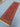 Side angle of vintage wool kilim rug placed in entryway