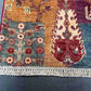 Corner detail of tribal geometric pattern in patchwork kilim carpet