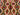 Close-up of red and green tribal diamond pattern