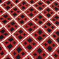 Detailed pattern from corner of boho tribal kilim rug – red wool