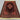Handmade tribal wool rug placed on wooden floor in living room