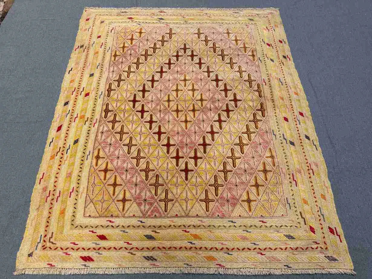 Floor layout of handmade wool kilim in a modern bohemian home