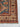 Corner close-up of geometric motifs on Turkish wool rug