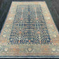 Blue and beige Turkish wool rug styled for home interior décor