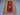 Full view of Turkish Kilim rug 4x5.1 ft laid on floor – tribal red and green medallion