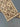 Close-up of corner weave detail on Turkish Kilim runner – brown and beige geometric pattern.