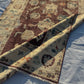 Folding display of Turkish wool Oushak rug with oriental design