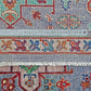 Close-up of Turkish rug with blue and multicolor details