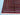 Detailed corner of handmade Afghan wool rug – Red & Navy tones