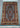 Room decor with authentic Persian silk rug in black and turquoise