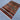 3x4 handmade Oriental wool rug styled on wooden floor