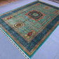 Handmade 6x9 vintage Mamluk rug styled on living room floor – wool silk Oriental design