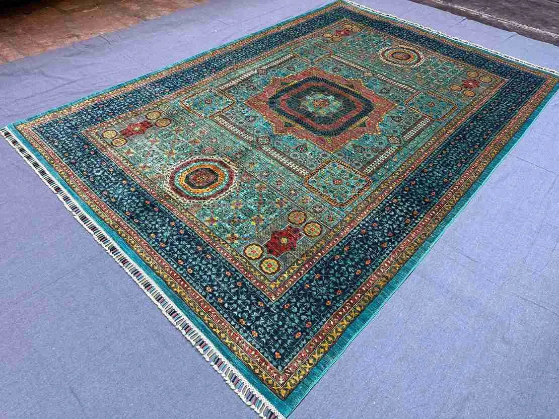 Handmade 6x9 vintage Mamluk rug styled on living room floor – wool silk Oriental design