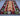 Flat-lay image of authentic handwoven kilim rug in vibrant colors