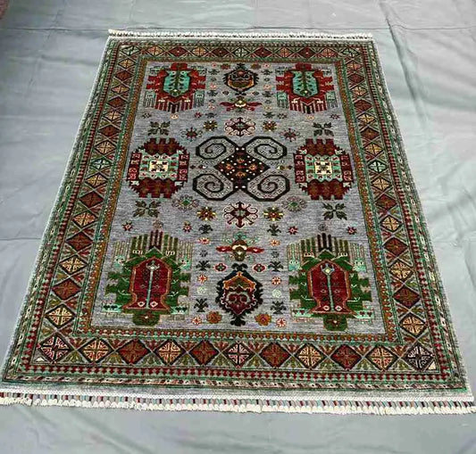 Waziri 6x9 ft rug styled on hardwood floor in living space