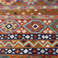 Close-up of wool flatweave texture – vibrant handmade 8x11 Persian-style Khorjin rug.