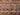 Close-up of wool flatweave texture – vibrant handmade 8x11 Persian-style Khorjin rug.