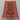 Layout of vintage Persian Afghan rug styled in a home setting