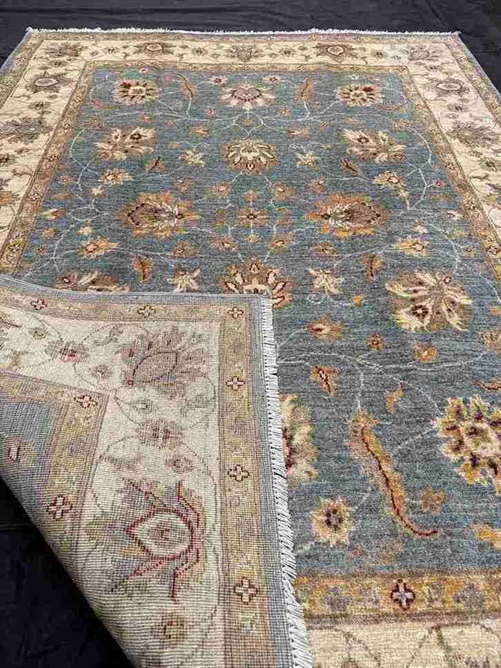 Folded texture and weave of Ziegler Chobi handmade carpet