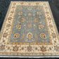 Top-down view of Afghan blue Ziegler Chobi rug 5x7 f
