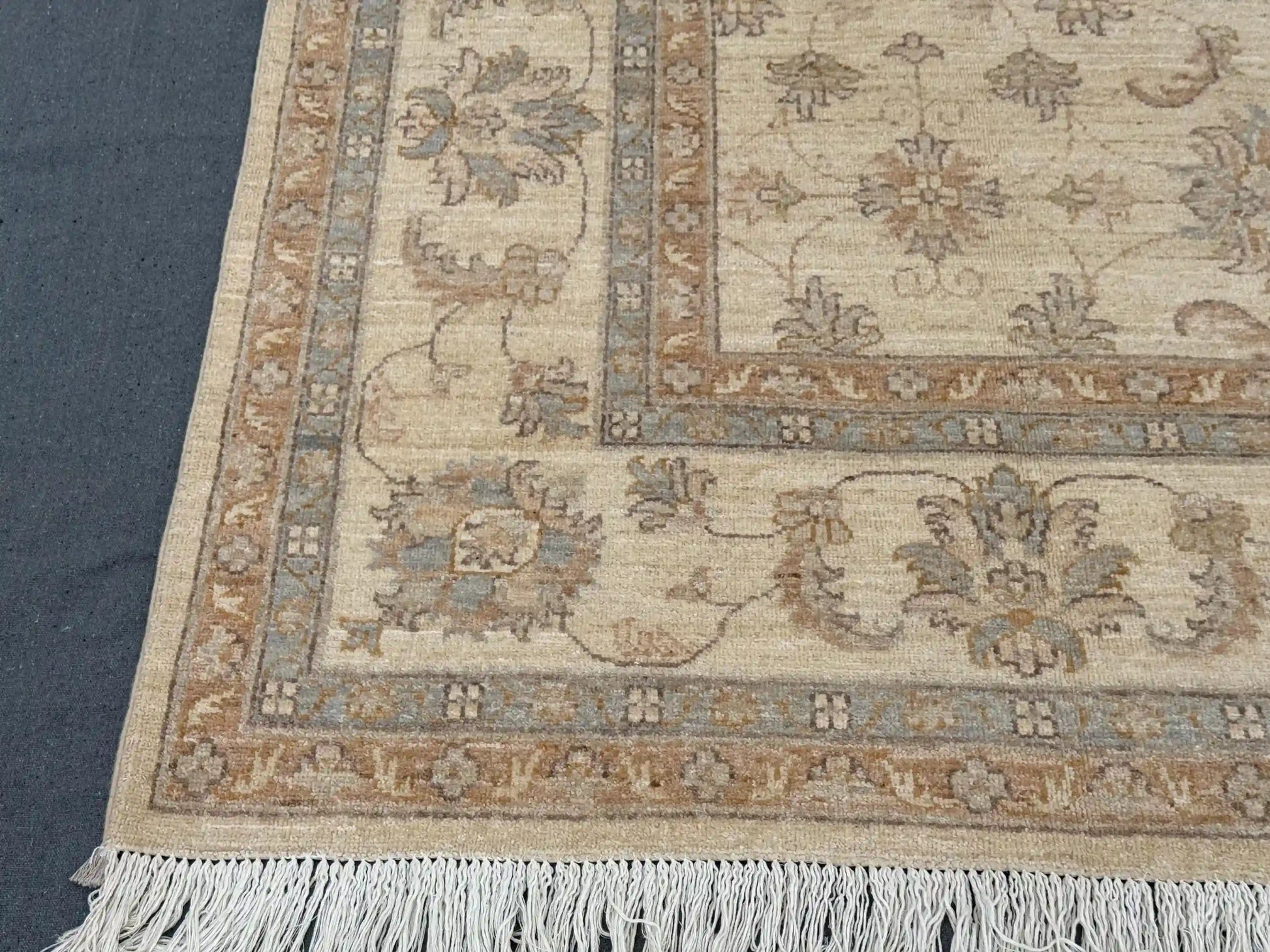 Corner detail of Persian-style wool Ziegler rug